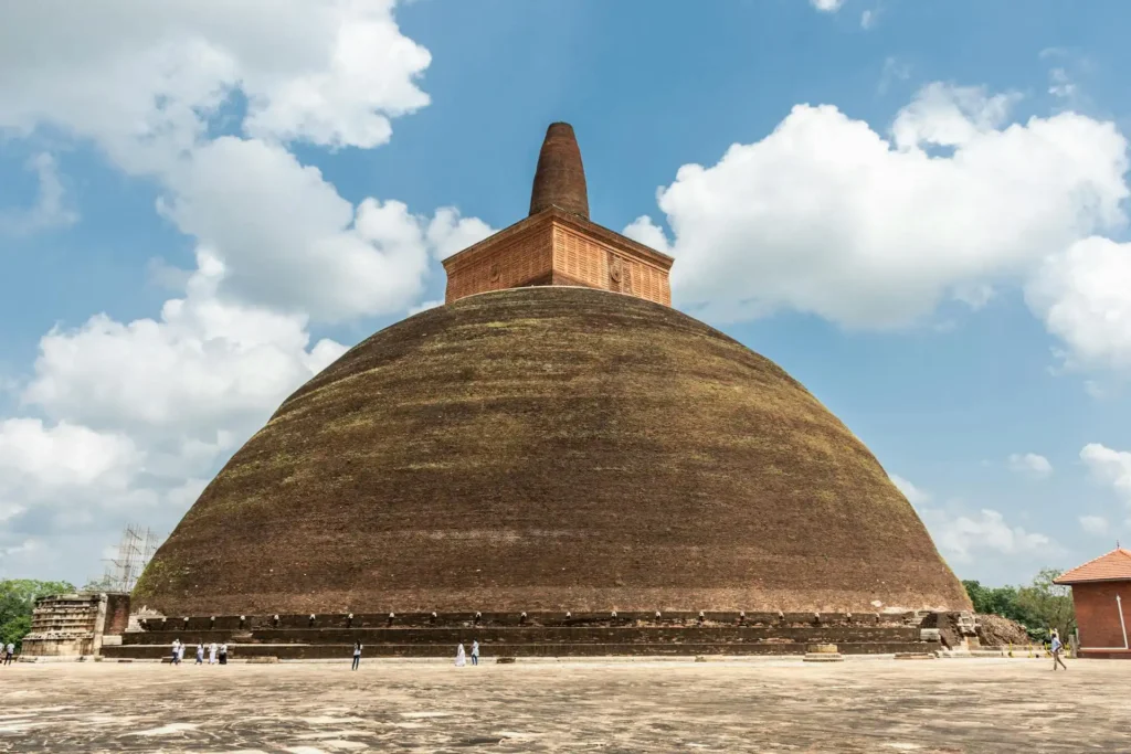 The massive ancient brick Jetavanaramaya Stupa towering over the Anuradhapura sacred city ruins.